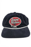 Common Saints Coast Ink Blue five-panel corduroy snapback cap with Saint Riders patch and white rope detail, front view
