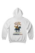 Back view of Common Saints white pullover hoodie with cowboy, black horse and surfboard graphic, plus “The Last Frontier” text